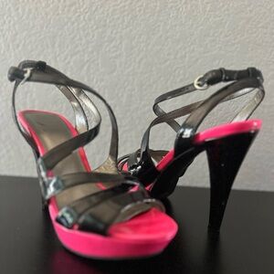 Size 8 G by Guess barely worn black and pink heels.